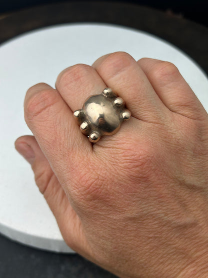 Oval Statement Ring Framed by 6 Circles